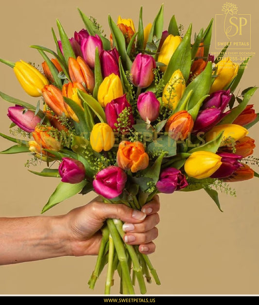 Color Her World vase with colorful tulips flowers and Easter decorations for a happy Easter celebration