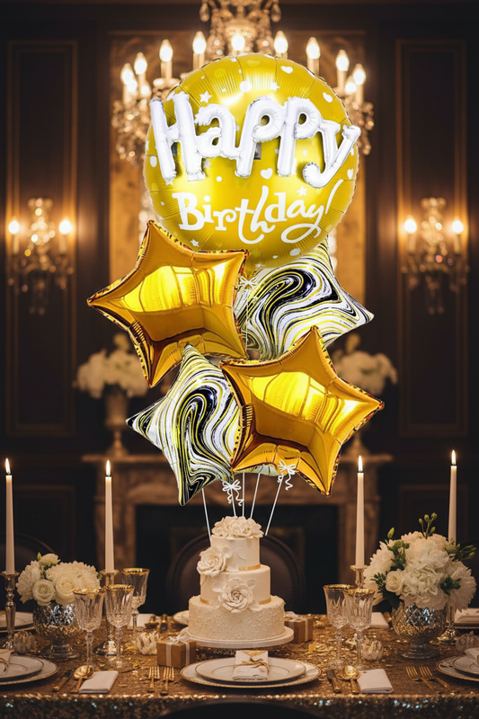 Elegant gold birthday balloon bouquet in luxury party interior with golden light and celebration table – SweetPetals premium gold birthday balloon gift New York