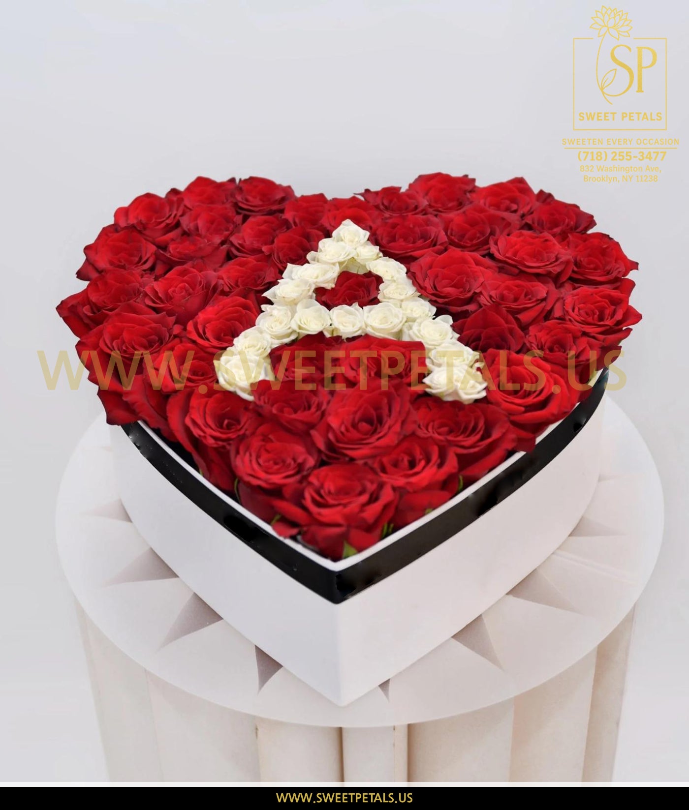 Luxury valentines heart box featuring valentine day red rose arrangement in a cute box for Valentine’s Day romantic gifting.