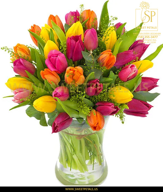 Color Her World vase with colorful tulips flowers and Easter decorations for a happy Easter celebration