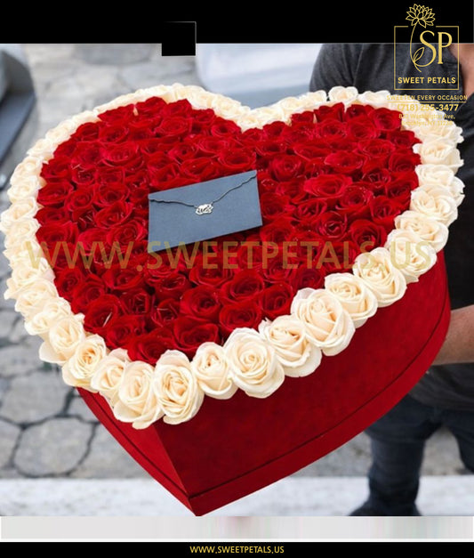 Heart shaped flower box filled with red and white roses arranged as a heart, luxury heart shaped box of roses, forever rose heart box for romantic Valentine’s Day gift