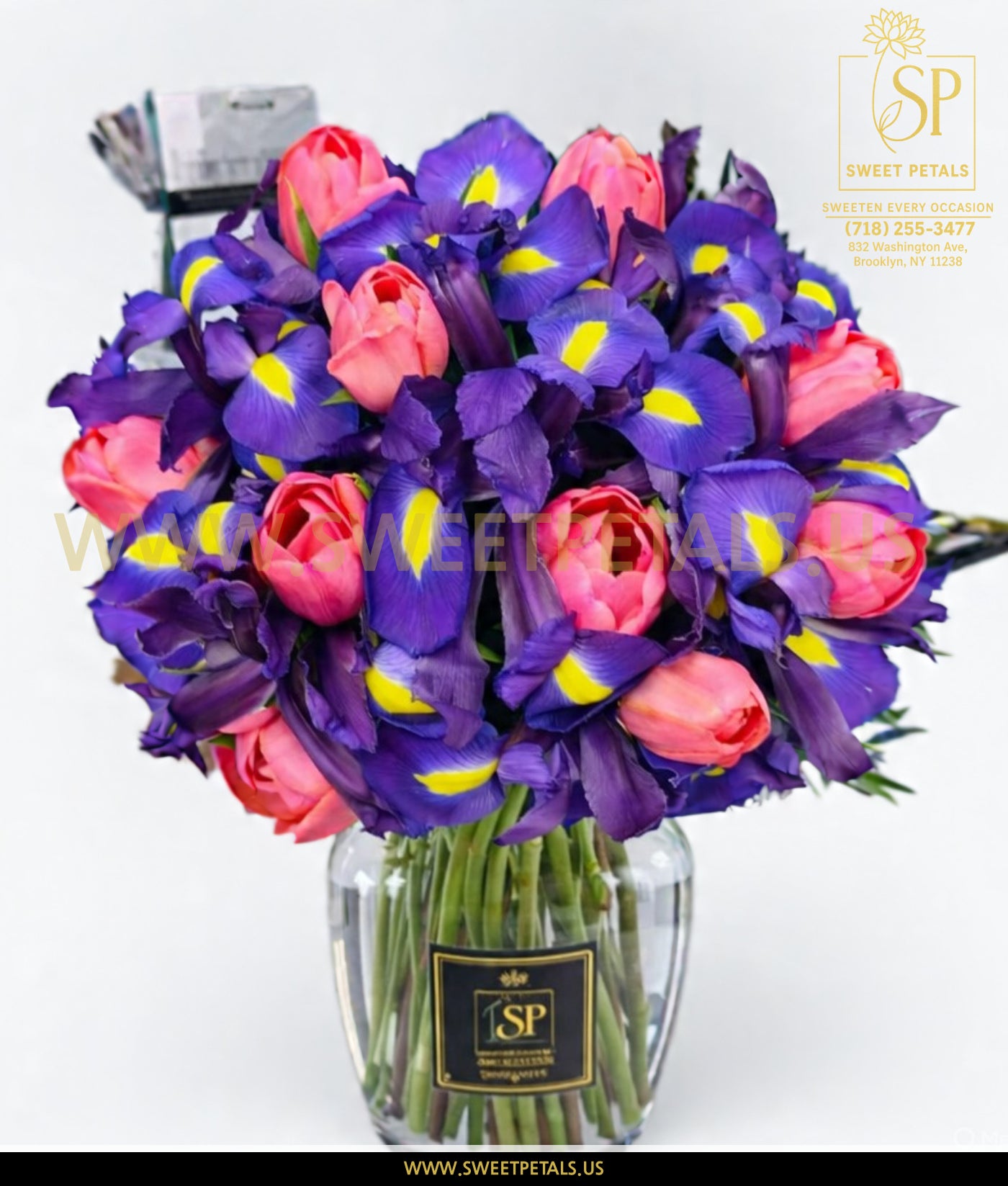 Pink impression tulip bouquet with pink iris flowers, elegant floral arrangement with soft pastel tones