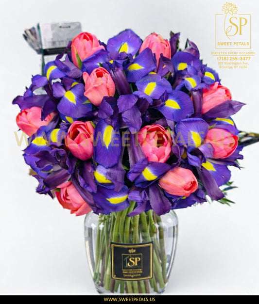 Pink impression tulip bouquet with pink iris flowers, elegant floral arrangement with soft pastel tones