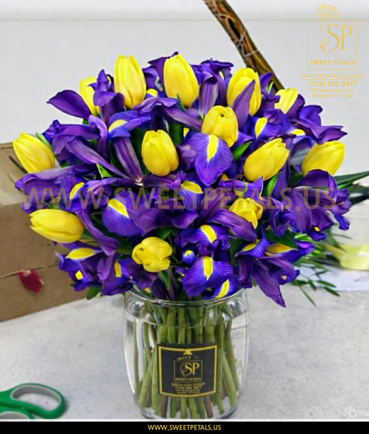 Bright yellow tulips bouquet with iris flowers, sunny floral arrangement available for same day delivery