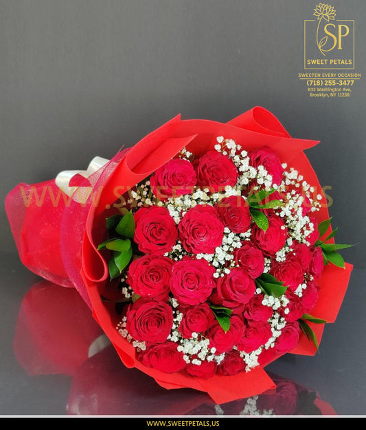Valentine flowers bouquet with fresh valentines day roses and red roses valentines day wrapped in elegant red paper
