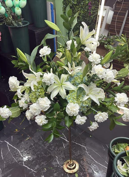 White lily and carnation centerpiece with green hydrangea on a gold stand, SweetPetals USA