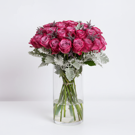 Luxury magenta spray roses in tall clear glass vase – SweetPetals premium flowers Brooklyn Manhattan