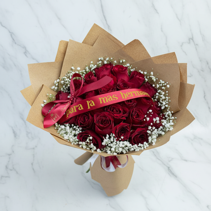 Overhead top-down view of crimson red roses and baby's breath in kraft paper bouquet – SweetPetals luxury flowers NYC