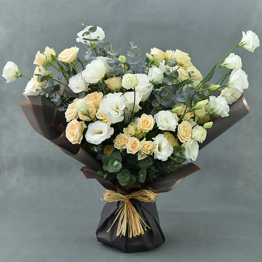 Cream Spray Rose & Lisianthus Bouquet – Peach Roses & White Lisianthus in Dark Wrap